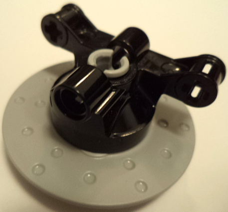 Part 23801c03 - Technic, Steering Axle with 2 Pin Holes and 2 Arms with Axle Holes with Slots with Light Bluish Gray Wheel Hub 3 Pin Holes Round (23801 / 35189) - De BrickPlaats