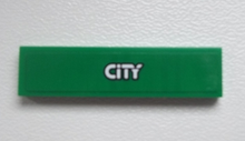 Part 2431pb0310 - Tile 1 x 4 with Silver 'CITY' on Green Background Pattern (Sticker) - Set 60020 - De BrickPlaats