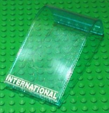 Part 2572pb06 - Panel 6 x 6 x 9 Curved Top with White 'INTERNATIONAL' and Thin Lines Pattern (Sticker) - Sets 7894 - De BrickPlaats