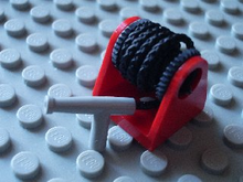 Part 2584c05 - String Reel 2 x 2 Holder with Black Drum with Black String 35L with Light Gray Hose Nozzle Simple (2584 / 2585 / 194cx2) - De BrickPlaats