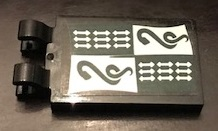 Part 30350bpb091 - Tile, Modified 2 x 3 with 2 Clips with Slytherin Banner Pattern (Sticker) - Set 71043 - De BrickPlaats
