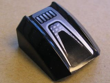 Part 30602pb047 - Slope, Curved 2 x 2 Lip with Black and Silver Pattern (Sticker) - Set 8132 - De BrickPlaats