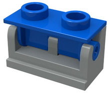 Part 3937c03 - Hinge Brick 1 x 2 with Blue Top Plate (3937 / 3938) - De BrickPlaats