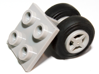 Part 4870c01 - Plate, Modified 2 x 2 Thin with Dual Wheels Holder - Split Pins with Light Gray Wheels and Black Tires (4870 / 4624 / 3139) - De BrickPlaats