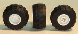 Part 6014bc04 - Wheel 11mm D. x 12mm, Hole Notched for Wheels Holder Pin with Black Tire 24 x 12 R Balloon (6014b / 56890) - De BrickPlaats