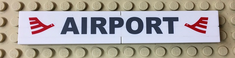 Part BA097pb01 - Stickered Assembly 12 x 2 x 2/3 with 'AIRPORT' Pattern (Sticker) - Set 7894 - 1 Plate 2 x 12, 4 Tile 1 x 6 - De BrickPlaats